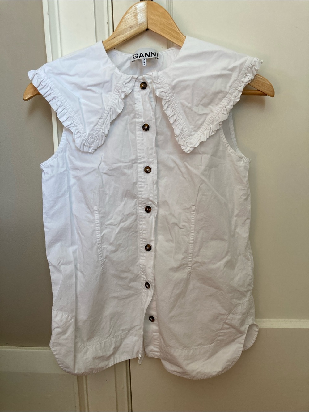 Ganni White Sleeveless Button-Front Top with Oversized Ruffle Collar